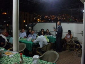 Miguel shares his writing with poets in Medellin